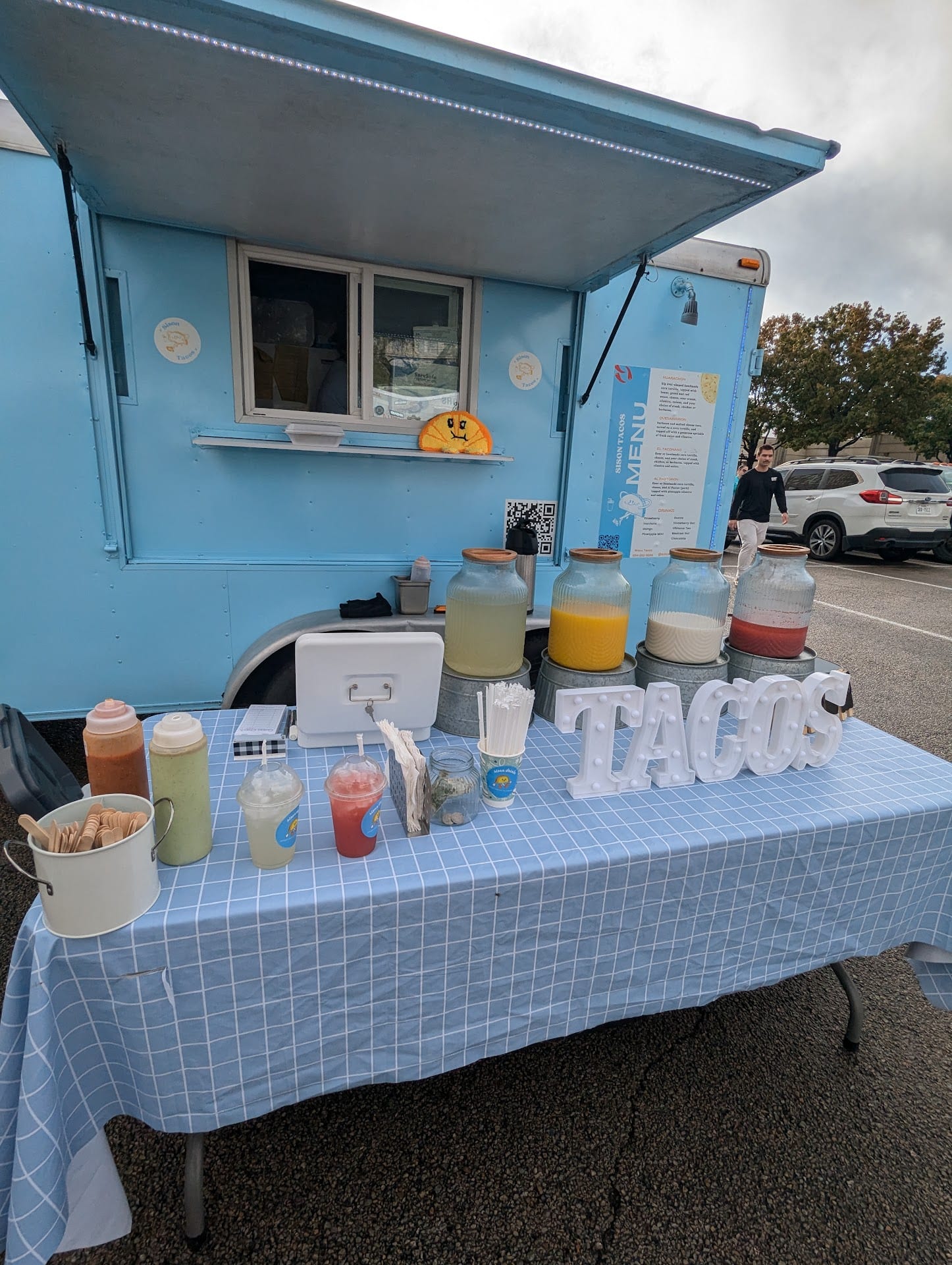 Sison Tacos food truck with fresh aguas frescas at a Waco event